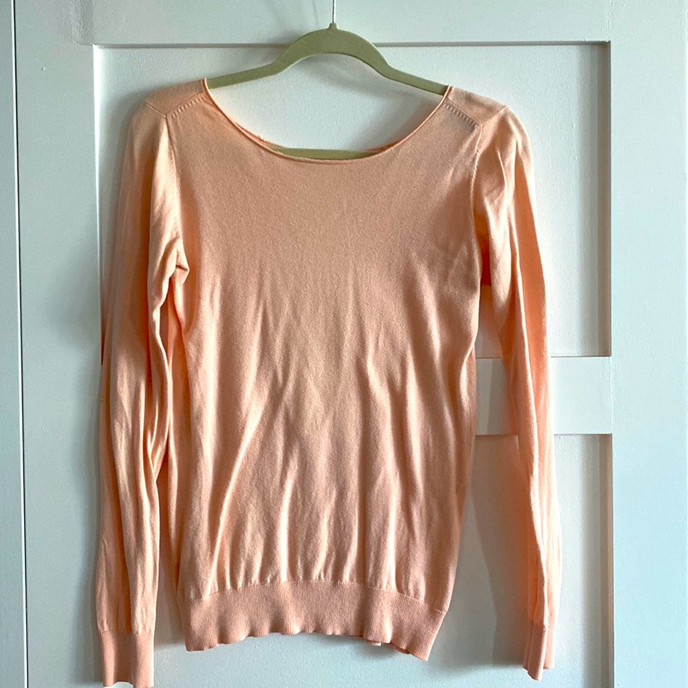 Pale pink open back shirt